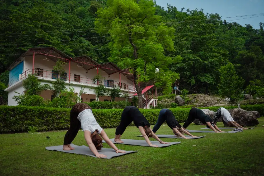 Students attending a 200 hour yoga teacher training class in Rishikesh India, the foundational certification for beginner and intermediate yoga practitioners